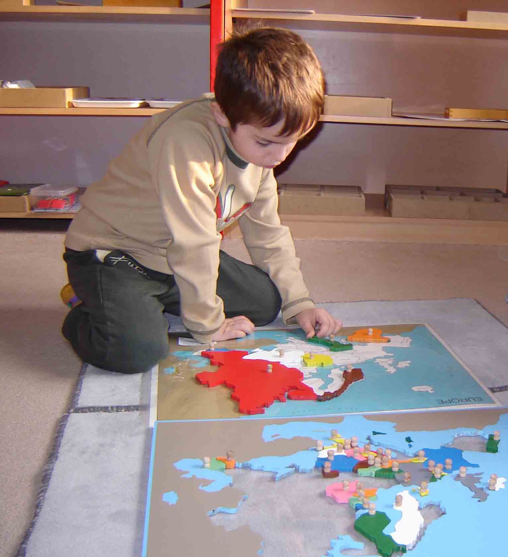A child in a Montessori classroom in Macedonia working with classical Montessori materials.